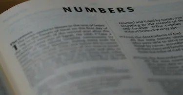 white printer paper on brown wooden table